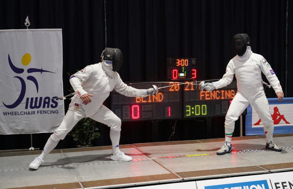 Two blind fencers duel on the piste